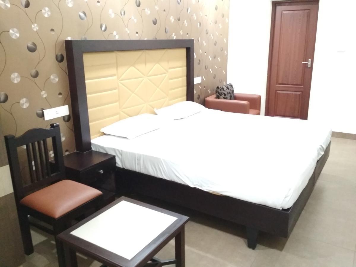 Hotel Rukmini Alwaye Extérieur photo